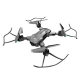 Quadcopter drone with four propellers, dark gray body, and blue accent lights