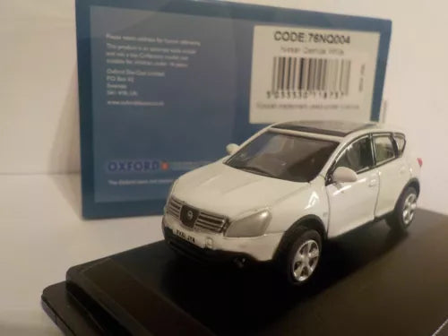 White Nissan Qashqai diecast SUV model car, 1/76 scale, front three-quarter view