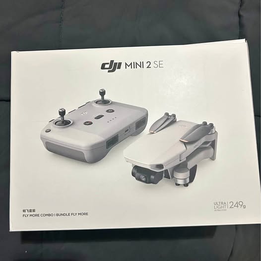 DJI Mini 2 SE foldable drone with remote controller, gray design