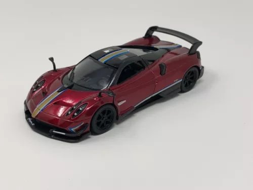 Red diecast sports car model with black wheels and Pagani-style livery