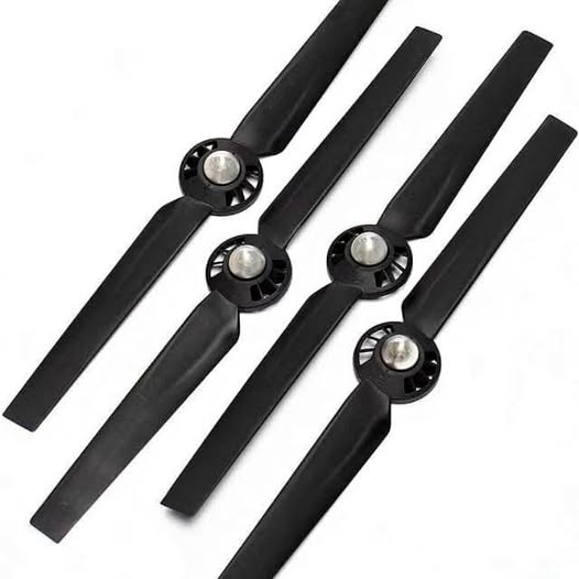 Drone propeller set with four black propellers and silver hub centers