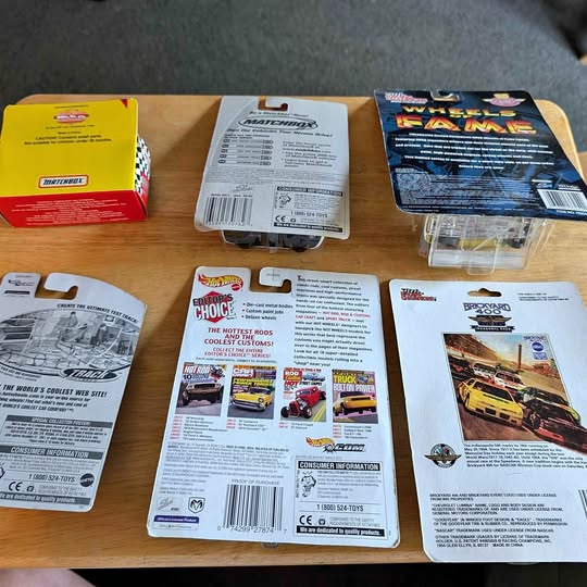 1/64 scale diecast toy car collectible in retail packaging, multiple blister cards