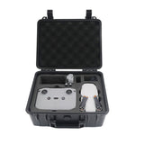 Hard case drone storage box with foam insert, open lid, holding a gray quadcopter