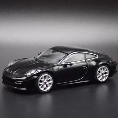 Porsche 911 GT3 Touring die-cast model car, black with silver wheels, 1:64 scale