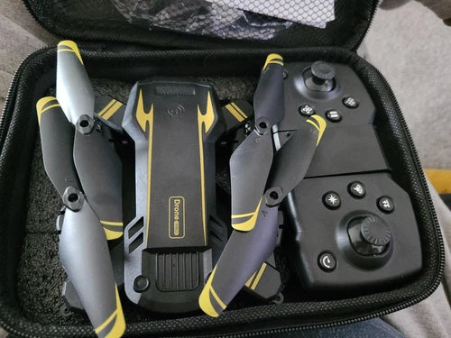 Foldable camera drone and remote controller in storage case