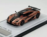 Orange and black race car diecast model with front grille and wheels