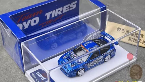 Blue Nissan 180SX diecast model car in clear display box, 1/64 scale