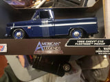 Blue diecast 1966 Chevy C10 fleetside pickup truck model, side view