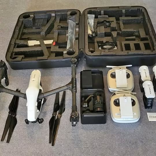 Drone bundle in hard case with controller, batteries, and accessories