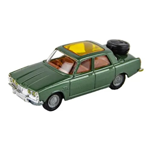 Green diecast model car with yellow interior and black rear spare tire