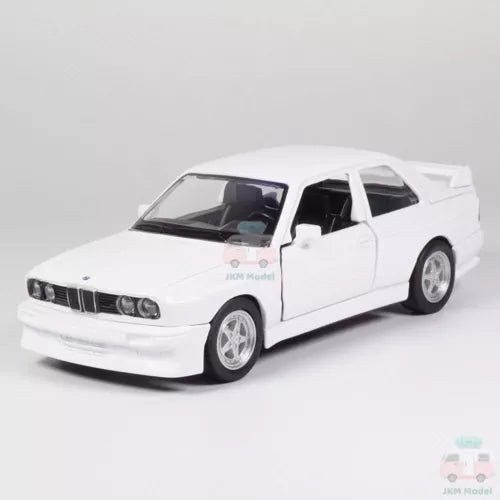 White 1/36 scale alloy diecast toy model car, BMW M3 1987, front 3/4 view