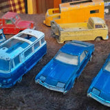 Diecast toy cars set: blue cars and a yellow truck in 3/4 view