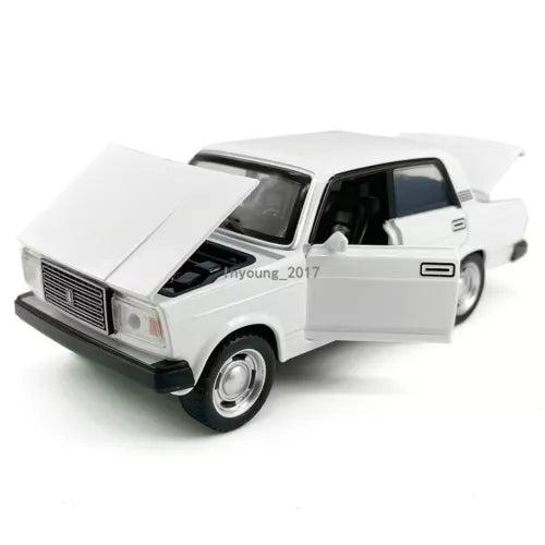White 1:32 diecast toy car with open hood and driver-side door, metal detail
