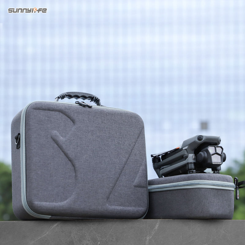 Gray padded drone carrying case with zip closure and fitted interior for drone body