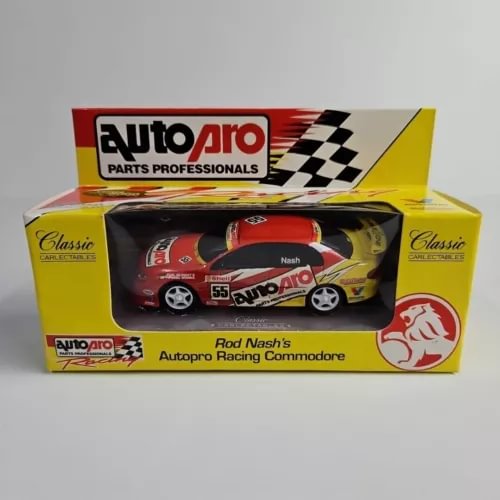 Diecast racing car model in Autopro display box, red and yellow #55