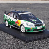 1:12 scale Skoda racing car diecast model with green and white livery