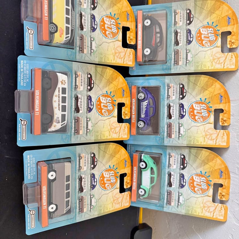 Diecast vehicle set in blister packaging, multiple cars and trucks
