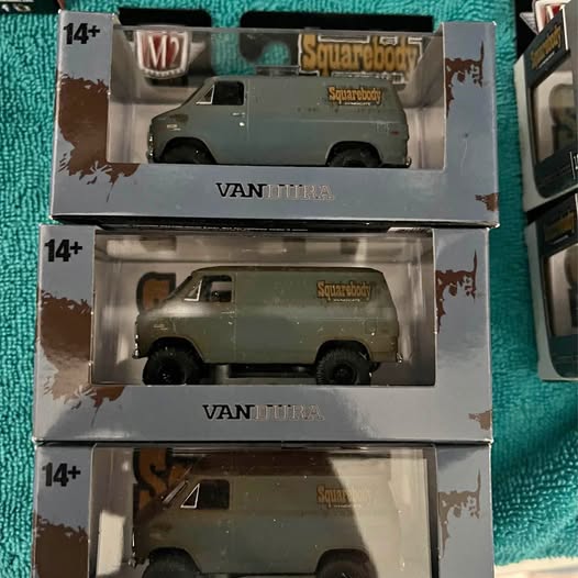 Diecast VanTura toy vehicle in blister box, dark gray, front three-quarter view
