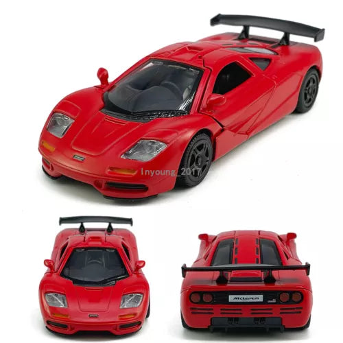 Red diecast model car with open cockpit and rear wing, collectible metal toy vehicle.