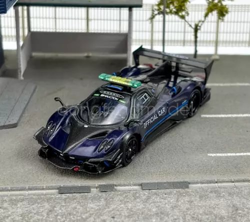 1:64 scale race car diecast, blue and black, front view with rear wing