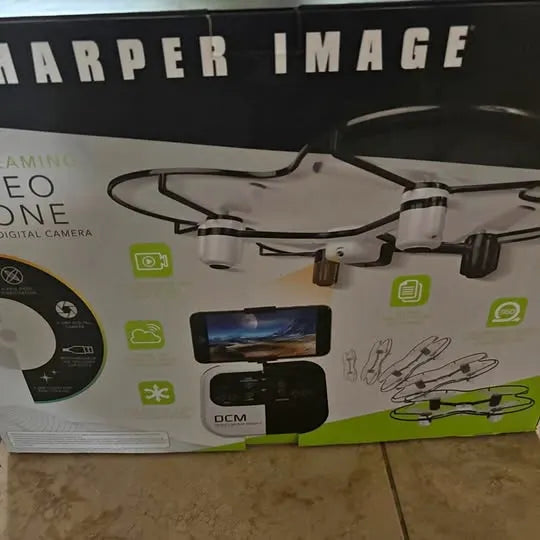 Drone packaging with illustrated quadcopter drone and camera feature icons