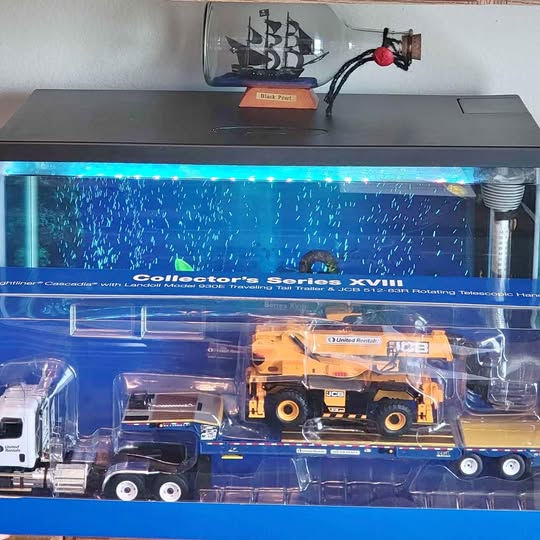 Diecast model set with yellow construction truck, white trailer, in clear blister packaging