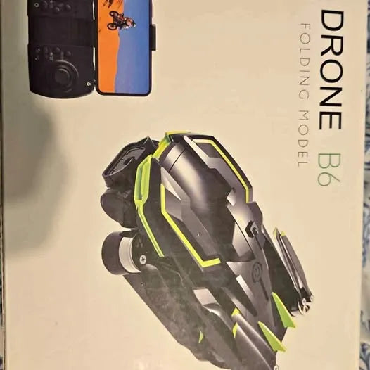 Folding model drone with metallic body and neon green accent lines