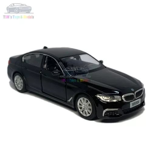 Black 1:36 scale BMW M550i xDrive diecast model car, front 3/4 view