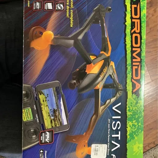 Orange and gray foldable drone with camera and controller, shown in retail packaging