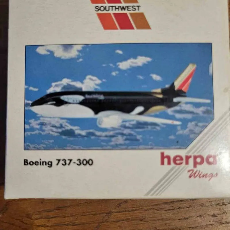 Diecast Boeing 737-300 Southwest jet model in herpa Wings box