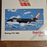 Diecast Boeing 737-300 Southwest jet model in herpa Wings box