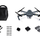 Foldable quadcopter drone with propellers, controller pieces, and carrying case