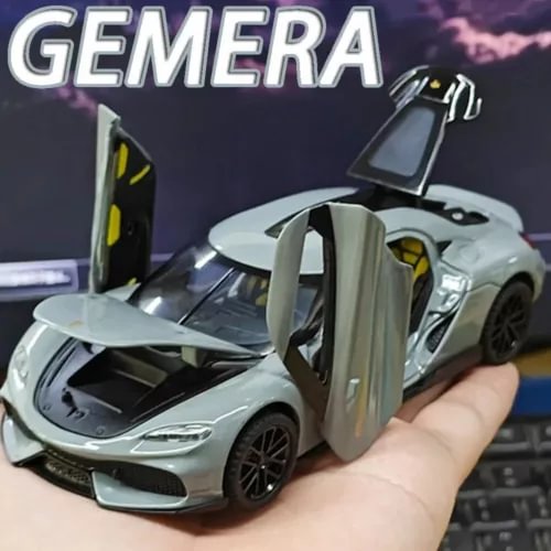 Diecast model car toy with open gullwing doors, light gray and black wheels