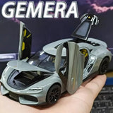 Diecast model car toy with open gullwing doors, light gray and black wheels