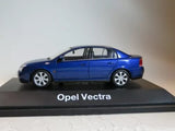 Blue Opel Vectra sedan diecast model with silver wheels