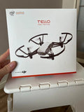 Tello programmable mini-drone retail box with printed quadcopter image