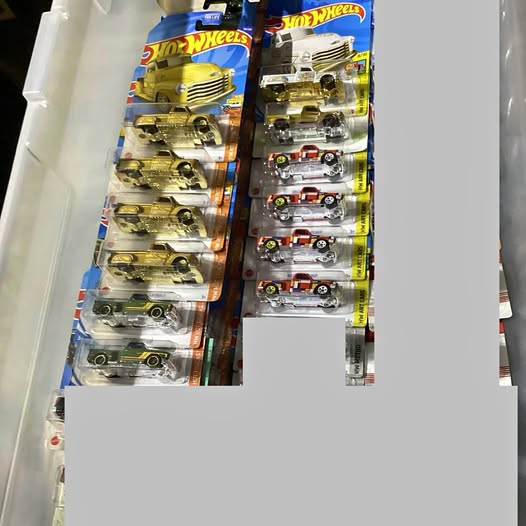 Diecast toy truck set in Hot Wheels blister packages, multiple styles