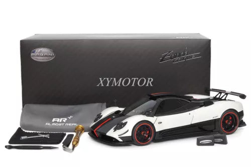 White and black 1/18 diecast model car with display parts, in presentation box