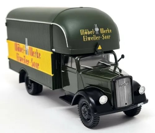 Green and black Opel Blitz diecast truck model with cargo box and grille