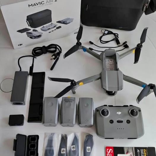 DJI Mavic Air 2 drone kit with controller, batteries, and landing legs