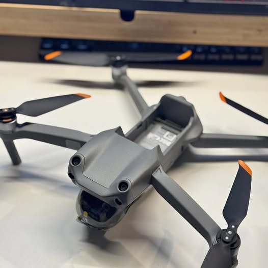 DJI Air 2S drone, gray quadcopter with four foldable propellers