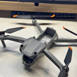 DJI Air 2S drone, gray quadcopter with four foldable propellers