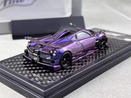 1/64 scale purple metallic diecast model car on black display base