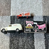 Toy diecast cars: white van and red car with Texaco collector limited edition box
