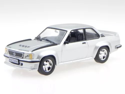 Silver and white vintage coupe diecast model car