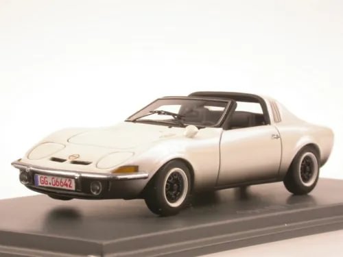 White diecast model sports car with black wheels, front three-quarter view