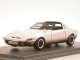 White diecast model sports car with black wheels, front three-quarter view