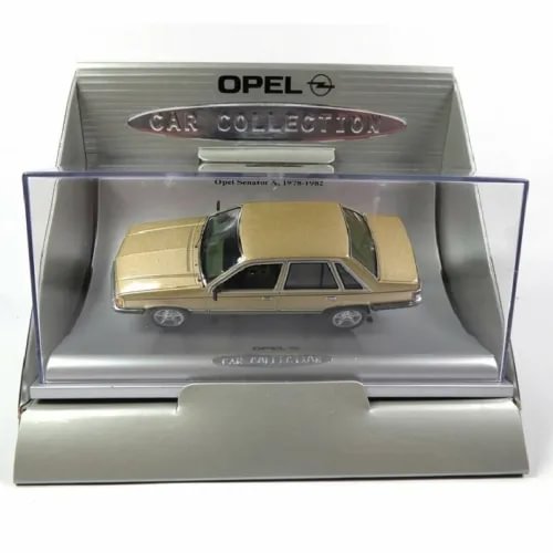 Diecast model car in display case, cream coupe with open doors and detailed wheels