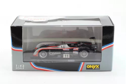 1:43 diecast race car model in clear box, black with red and white accents, ONYX