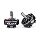 Brushless FPV racing motor, black housing with silver shaft and fins, green accents